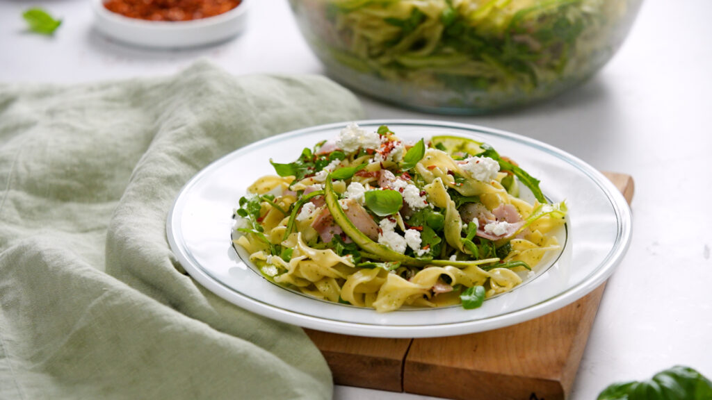 No Yolks Broad Noodles, pesto, ham, goat cheese noodle salad