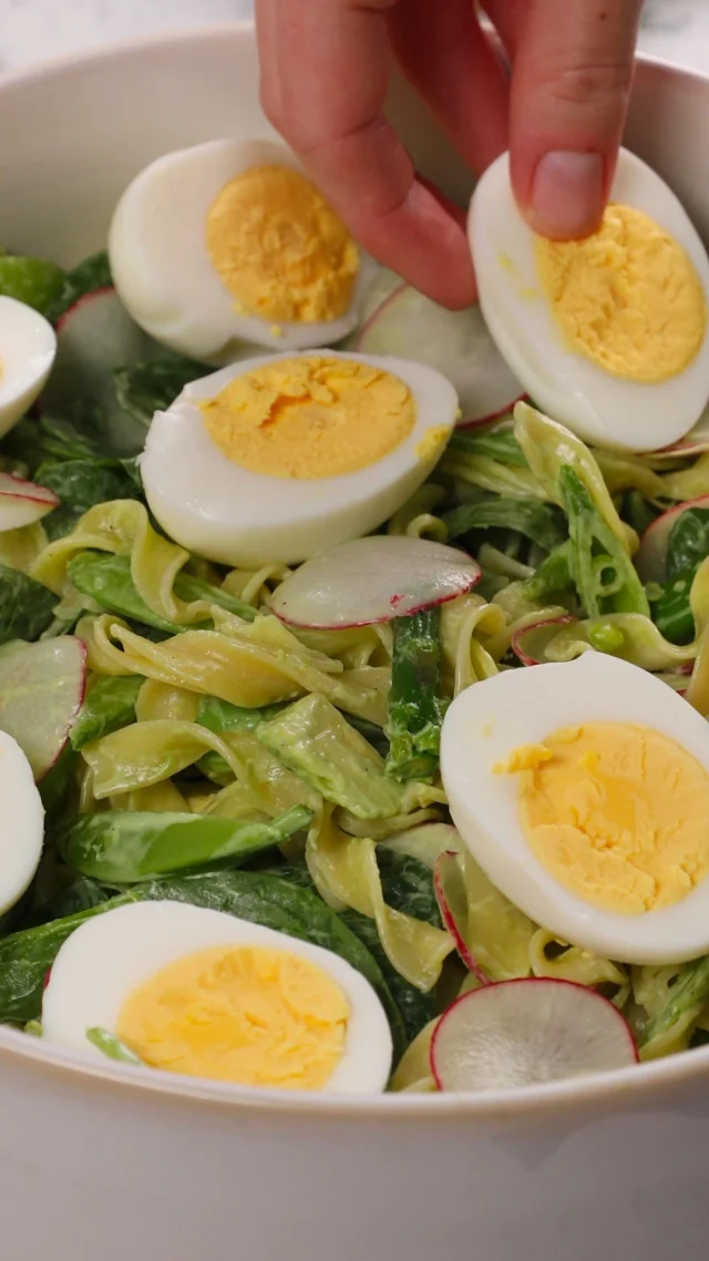 Loaded with fresh veggies and ready in 30 minutes, this No Yolks Cobb Noodle Salad is light, refreshing, and perfect for any day of the week. ☀️ Recipe details below.

Ingredients:
- 1 package No Yolks® Broad Noodles
- 1/2 bunch asparagus, stemmed and cut into 1-inch pieces
- 2 cups packaged baby spinach
- 2 cups snap peas, sliced on a bias
- 1 avocado, halved, pitted, peeled and diced
- 4 radishes, thinly sliced
- Avocado ranch dressing, as desired
- 4 large hard-boiled eggs, halved
- Dill springs, for garnish

Directions:
1. Cook the No Yolks® Noodles according to package instructions, and 2 minutes before the
noodles are finished cooking, add the asparagus and cook until tender. Drain the noodles
and asparagus and rinse under cold water. Set aside.
2. In a large bowl, toss the noodles, asparagus, spinach, snap peas, avocado, radishes and
dressing together until coated. Top with the hard-boiled eggs and dill. Serve.